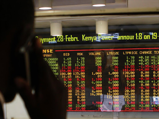 A stockbroker transacts shares during a trading session at the Nairobi Securities Exchange. /REUTERS