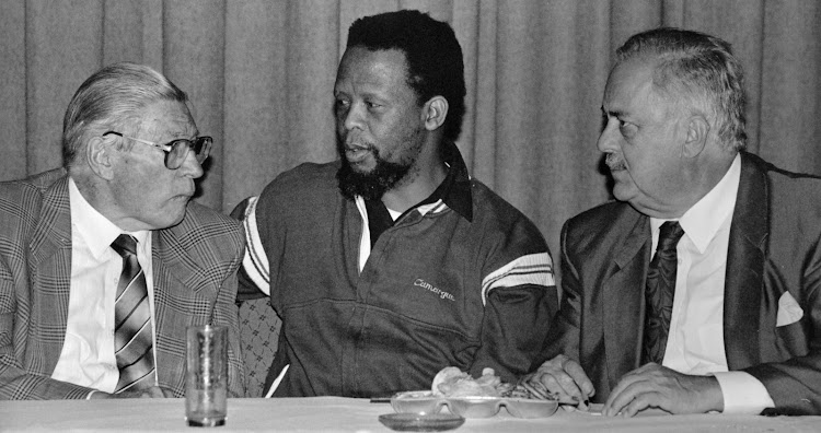 The UDF's Moss Chikane flanked by Rev. Beyers Naude (L) and Adv. George Bizos at the Carlton Hotel, Johannesburg, on August 23 1991.