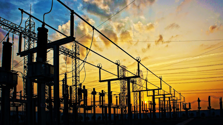 An electricity network at a transformer station at sunrise. Picture: ISTOCK