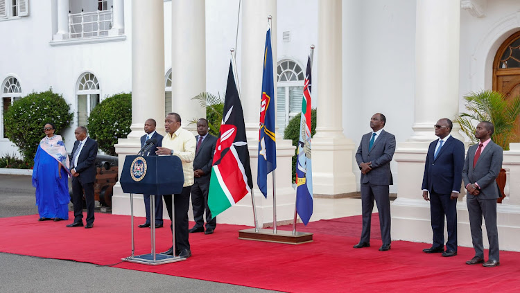 President Uhuru Kenyatta with members of the National Emergency Response Committee on Covid-19 at State House, Nairobi on April 6, 2020.
