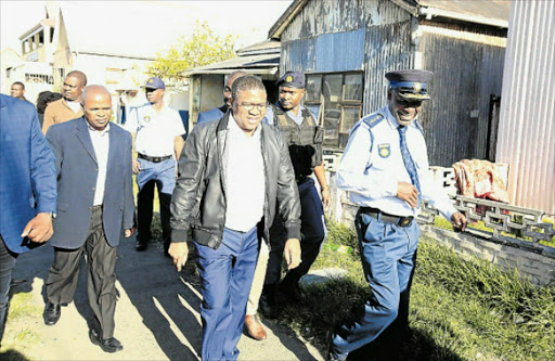 ON A MISSION: Police Minister Fikile Mbalula with national police commissioner General Khehla John Sitole Picture: SINO MAJANGAZA