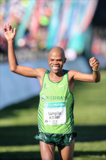 Lungile Gongqa winning the 2017 Old Mutual Two Oceans Marathon 56km on April 15, 2017 in Cape Town.