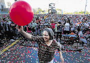 LET'S ALL LIGHTEN UP: Cape Town mayor Patricia de Lille starts the Festival of Lights celebrations at the Grand Parade last night