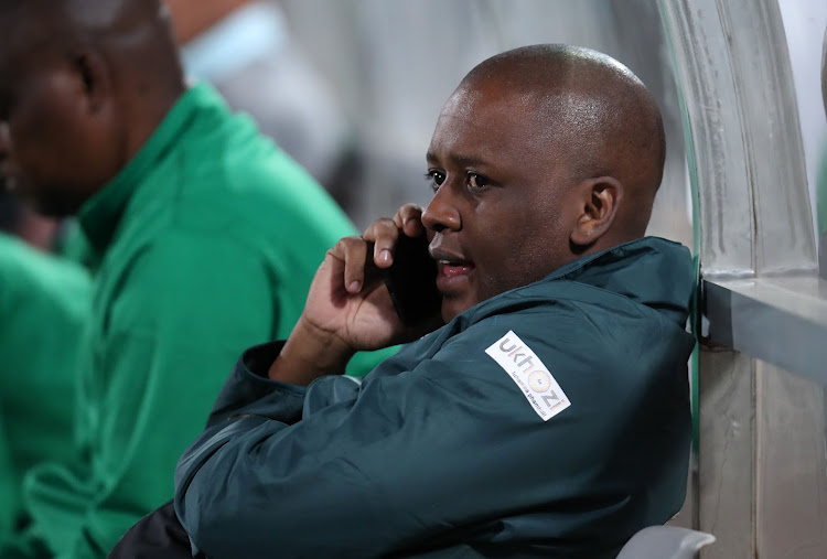 AmaZulu acting chairman Lunga Sokhela speaks on the phone during the Absa Premiership match against SuperSport United at Lucas Moripe Stadium in Atteridgeville, west of Pretoria on August 8 2018. Sokhela says Fifa are "heartless people and the biggest bullies who think they are the supreme law of the world.