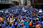 Some of the thousands of DA supporters attended a party march through the streets of downtown Johannesburg ,