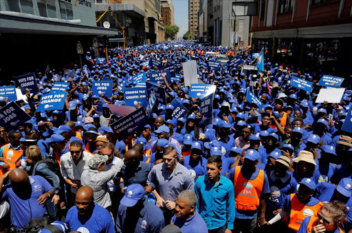 Some of the thousands of DA supporters attended a party march through the streets of downtown Johannesburg ,