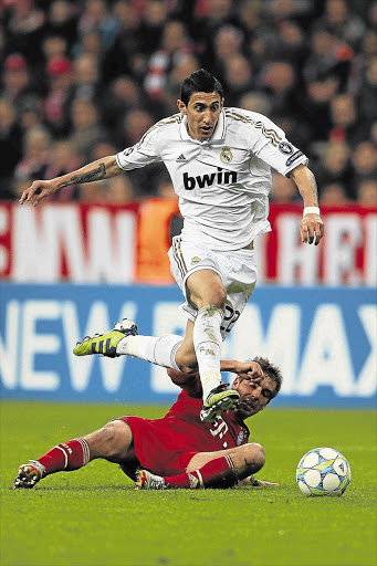 Angel di Maria (pictured here in the Real Madrid strip) has sealed a British transfer move to Manchester United. File photo