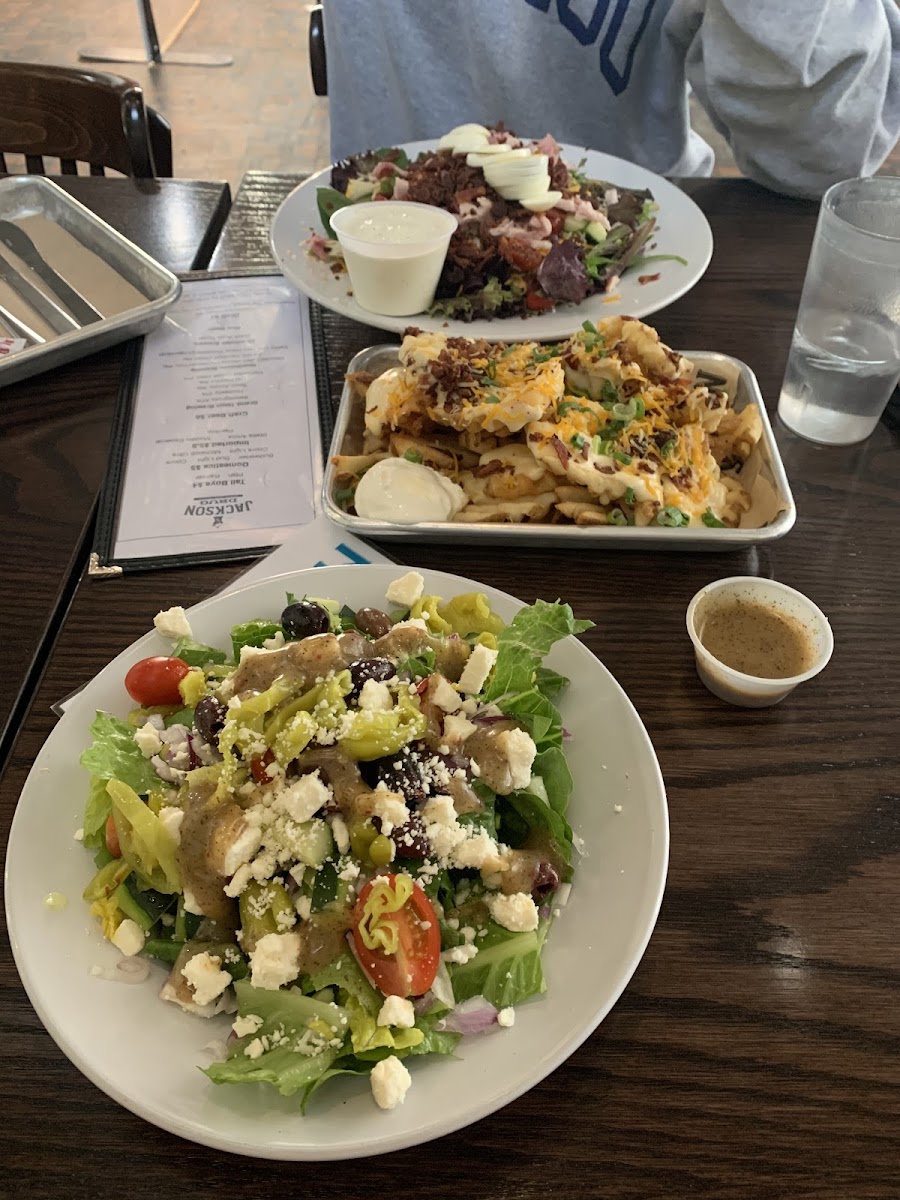 Greek and chef salads and loaded waffle fried