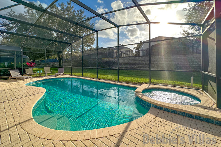 Sun-drenched west-facing pool and spa deck at this Windsor Hills vacation villa