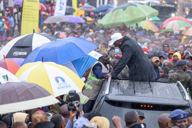 President William Ruto interacting with a resident of Kuresoi North Constituency, Nakuru on January 13, 2024