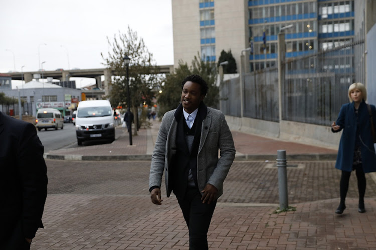 Duduzane Zuma arrives at Johannesburg Central Police Station to be processed prior to his appearance at the Specialised Commercial Crime Court.