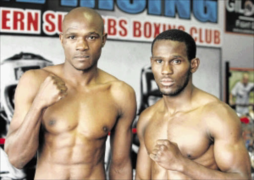 NO FEAR: Kaizer Mabuza, left, and Paul Kamanga after their pre-fight medical yesterday. Mabuza will challenge Kamanga for the WBA Pan African junior welterweight title on Saturday PHOTO: ANTONIO MUCHAVE