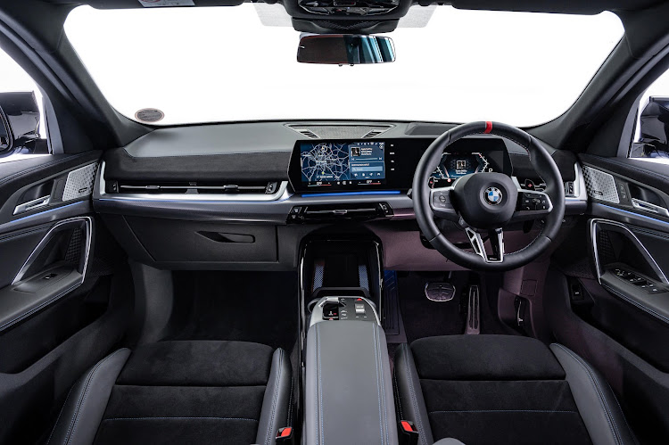 Interior is typically BMW with driver-centric feel.