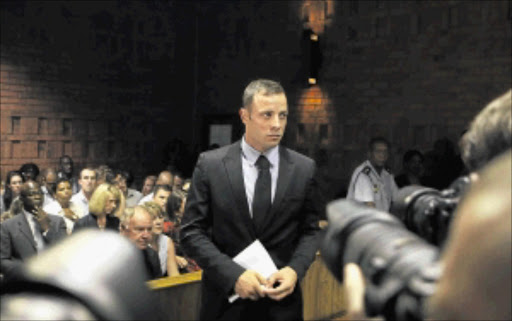 Oscar Pistorius stands in the dock. Photo: REUTERS