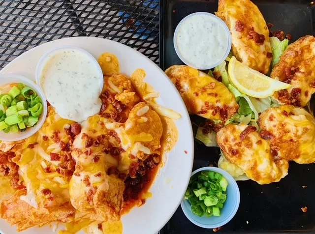 Loaded boneless wings & smothered potato skins