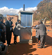 Vhembe district's mayor  Florence Radzilani  cuts the ribbon for  toilets handover in Limpopo, sparking  social media backlash over the event.
