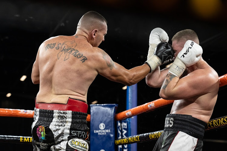 Shaun Potgieter (left) lands a punch on Keaton Gomes during their Power House Boxing Tournament fight at Emperors Palace on April 5.