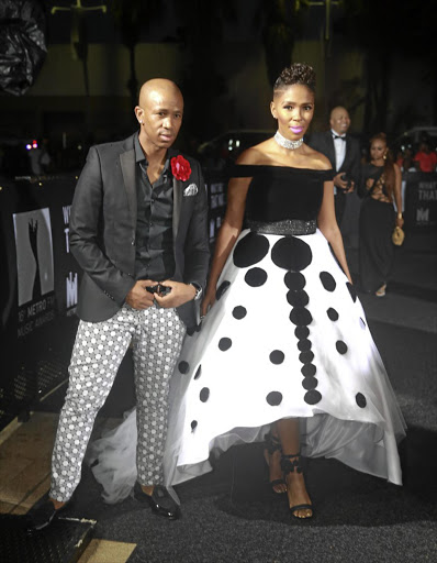 Nhlanhla Nciza and Theo Kgosinkwe of Mafikizolo won the best-styled group award at the Metro FM Music Awards.