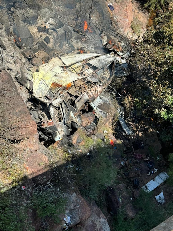 The wreckage of the bus in Limpopo. At least 45 people are thought to have died, but an eight-year-old girl survived and is being treated in hospital.
