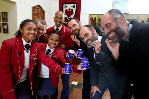 TANGLES AND TUFTS: Hudson Park High School teachers Patrick Mulcahy, Steve Anderson and Gareth van Harmelen are on a mission to raise funds for St Bernard’s Hospice by not shaving until the end of the third term. They share a light moment with with some of the prefects involved with the fundraising, from left, Ulricha Anthony, Emma Botha, Lerato Jan and Sipho Gysman Picture: ALAN EASON