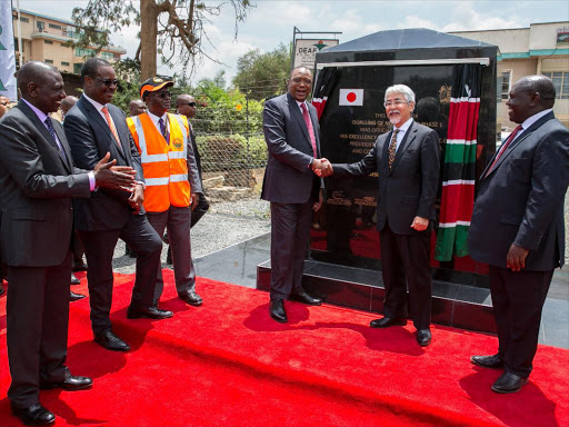President Uhuru Kenyatta with the ambassador of Japan to Kenya H.E. Mr. Toshitsugu Uesawa after unveiling a commemorative plaque of the launch of road works for the dualling of Ngong Road Phase 1 at Ngong Road /PSCU