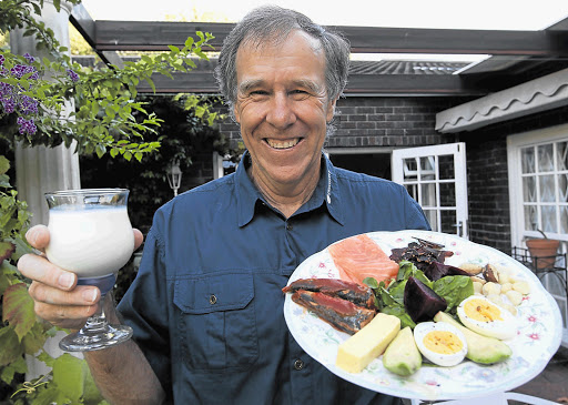 Professor Tim Noakes and a plate of the food he now recommends.