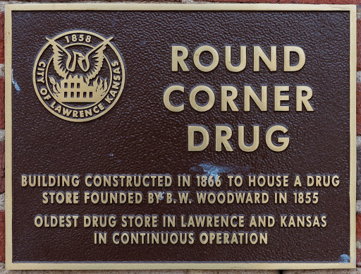 Round Corner Drug   Building constructed in 1866 to house a drug store founded by B. W. Woodward in 1855.   Oldest drug store in Lawrence and Kansas in continuous operation.   Submitted by: @shinton  