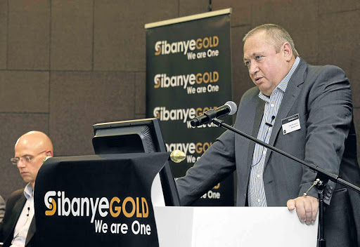 SOUND TRANSACTION: Sibanye chief executive Neal Froneman, right, made the announcement of the sale of Amplats’ R u st e n b u r g operation to Sibanye on Wednesday Picture: MARTIN RHODES