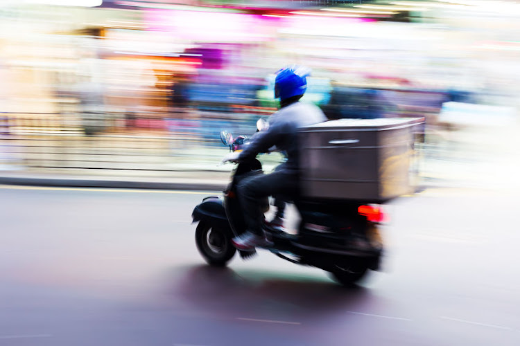 Food and grocery delivery is safe to use during the pandemic and will not transmit Covid-19 if health and safety protocols are observed. Stock photo.