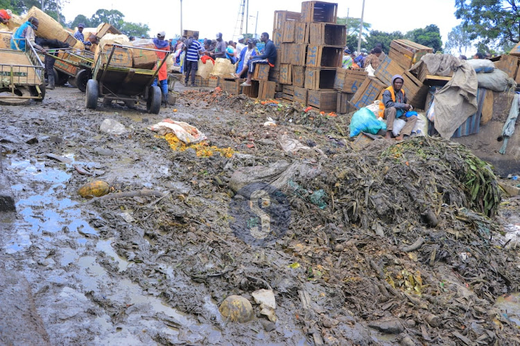 Traders trying to access the Muthurwa Market located near the dumpsite on April 16, 2024.