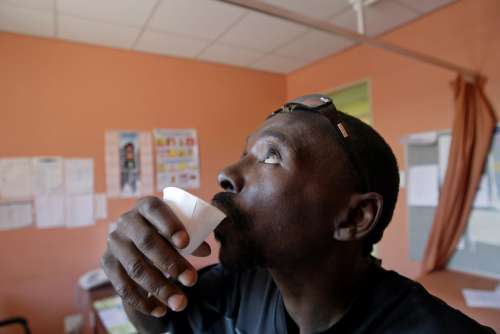 A patient takes his TB medication at Kuyasa Clinic in Khayelitsha, Cape Town. Picture: ESA ALEXANDER