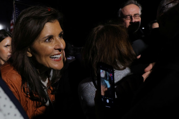Republican presidential candidate and former US Ambassador to the United Nations Nikki Haley greets audience members at a campaign stop in Myrtle Beach, South Carolina, US, February 22, 2024.