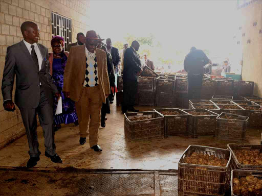 Nyandarua Governor Daniel Waithaka (2nd L) at Midlands Limited on Wednesday / BOB MURIUKI