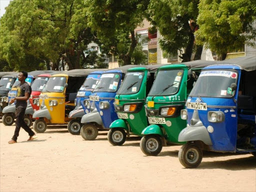 Tuk Tuk drivers queue in wait for passengers at a Mombasa terminal in this 2015 photo. /FILE