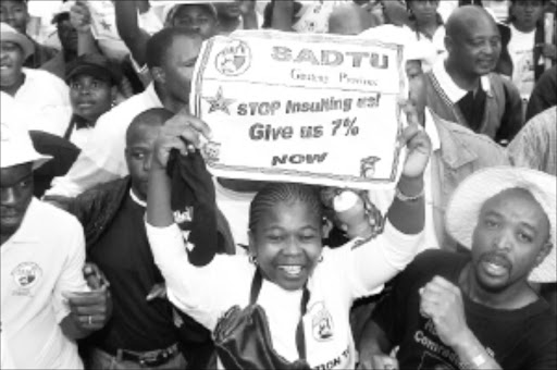 STRIKING ISSUES: Teachers could lose the right to strike if an application by the DA to the essential services committee succeeds. Pic. Veli Nhlapo. 02/09/2004. © Sowetan. SW20040902VNH028:NEWS:GENERIC:02SEP2004 - 20040902VNH: NEWS: Close to 20,000 teachers and nurses yesterday combined in a solidarity in Johannesburg CBD to demonstrate against the proposed 5,5percent wage increase both teachers and nurses demanding a 7 percent salary increase. PHOTO:VELI NHLAPO