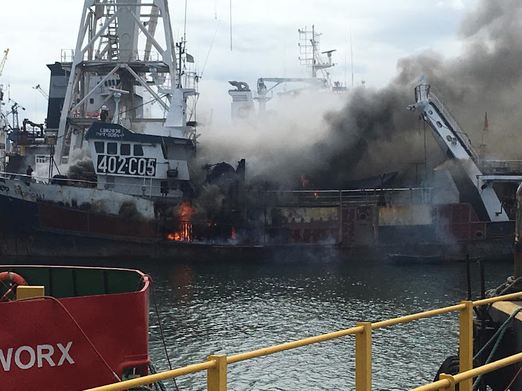 Emergency workers have treated 80 crew members for smoke inhalation after a fishing trawler caught alight at Durban's Bayhead area.