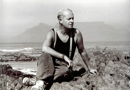 Pieter-Dirk Uys on the rocks at Bloubergstrand, Cape Town, in 1990.