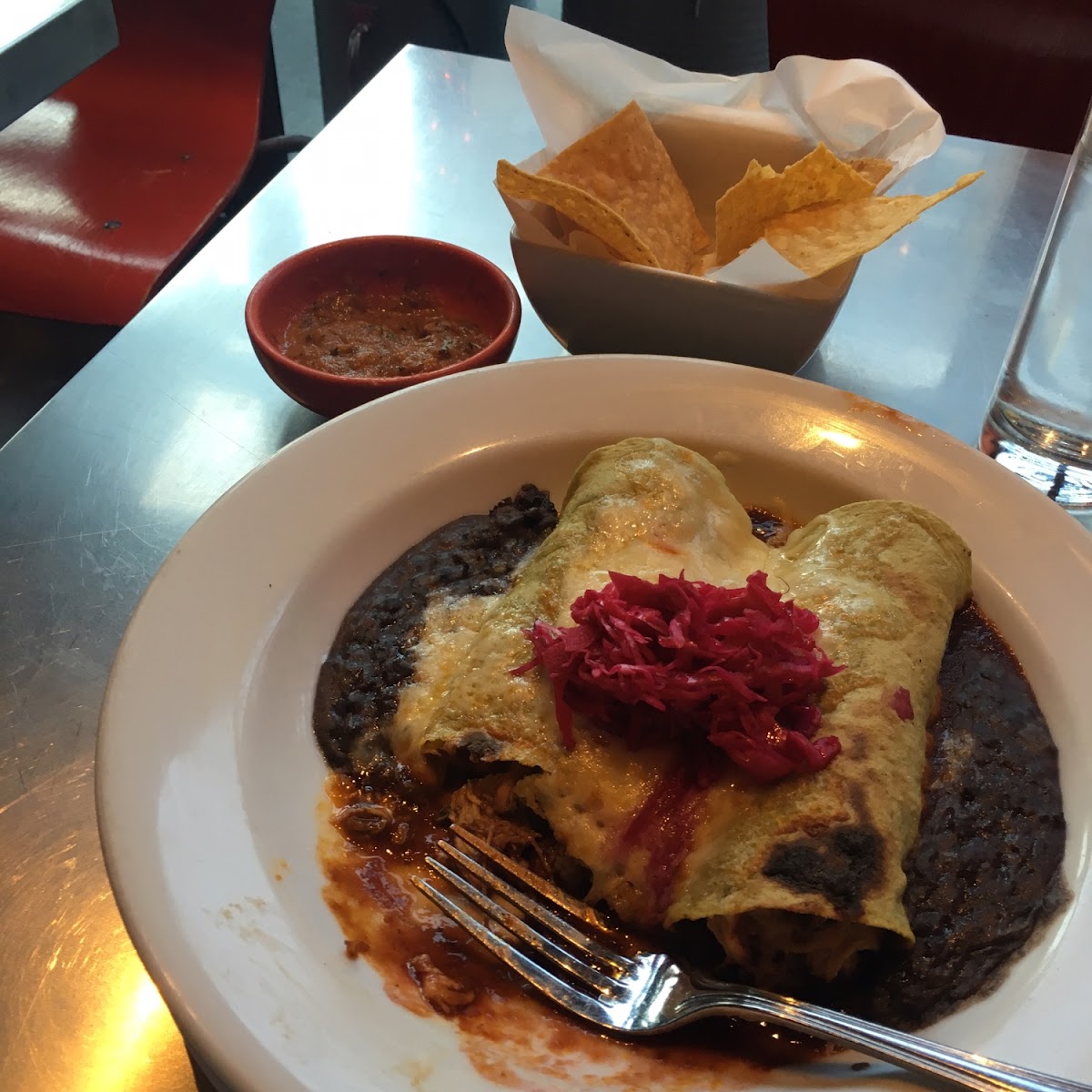 Chicken Enchiladas (different name of on menu) $12 for lunch, $18 for dinner. Wonderful dish!