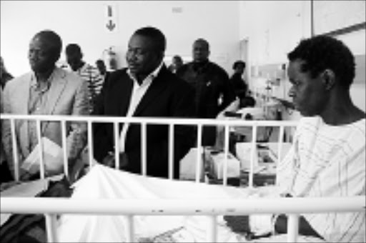 CONCERNED: Mpumalanga health MEC Fish Mahlalela and Mbombela mayor Lassy Chiwayo visit cholera patients at the Matikwane Hospital in Bushbuckridge yesterday. 19/01/2009. Pic. Alfred Moselakgomo. © Sowetan.
