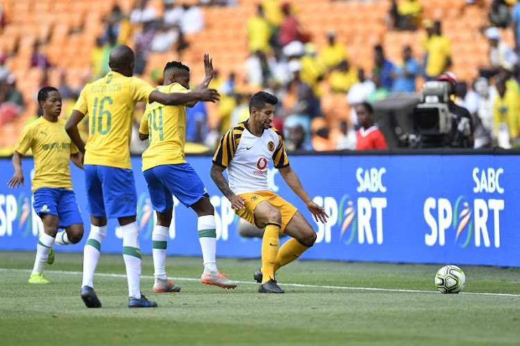 Kaizer Chiefs striker Leonardo Castro is challenge by Harold Majadibodu of Mamelodi Sundowns during the Shell Helix Ultra Cup match between Mamelodi Sundowns and Kaizer Chiefs at FNB Stadium on October 12, 2019 in Johannesburg, South Africa.