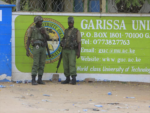 Kenya Administration policemen stand in front of Garissa University College in Garissa April 4, Garissa .Photo Reuters