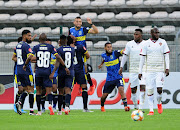 Cape Town City players celebrate after Chris David of  scored the only goal of the match. 