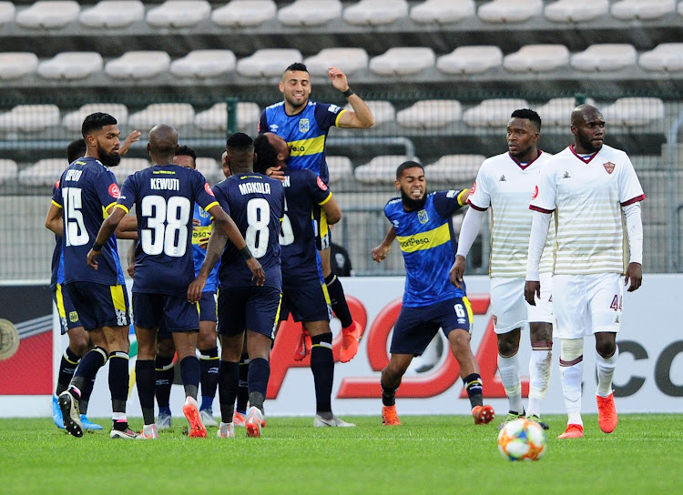 Cape Town City players celebrate after Chris David of scored the only goal of the match.