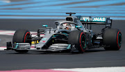 Lewis Hamilton tops the first-practice time sheets in his Mercedes.