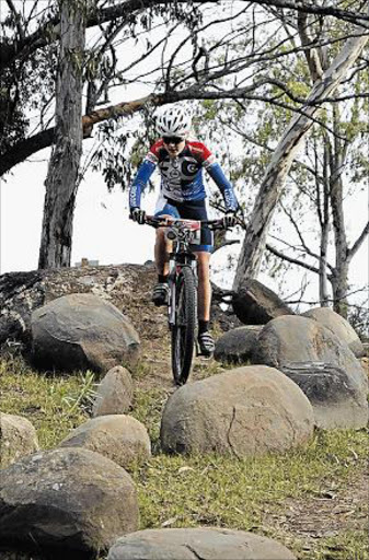 ROCKY RIDE: Elne Owen takes on the course during the Junior Ladies division of the Spur Mountanbike Challenge Picture: SUPPLIED