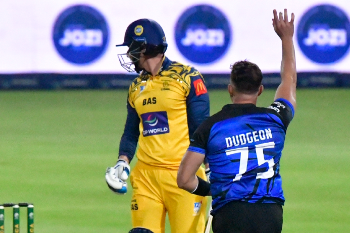KZN-Inland's Keith Dudgeon celebrates the dismissal of Rassie Van Der Dussen with the first ball of the match at the Wanderers on Saturday night.