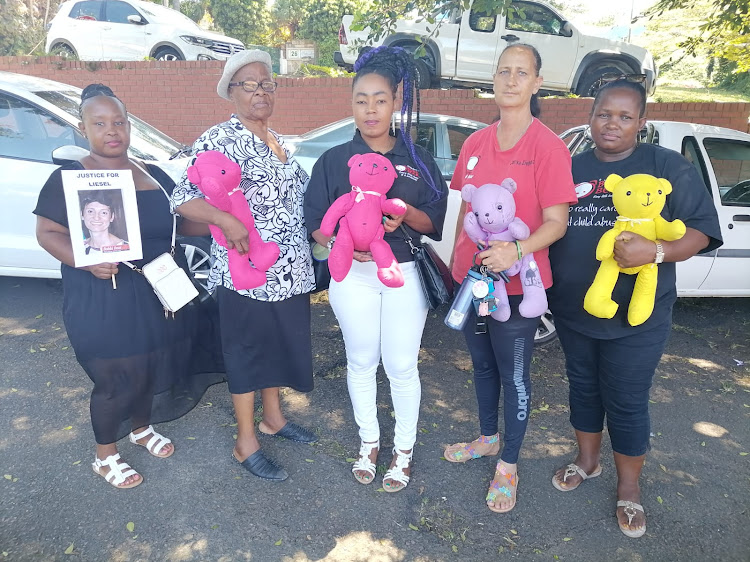 Nosipho Shange, Cynthia Nkukhu, Noxolo Khuzwayo, Carika Zietsman and Hlengiwe Mabaso outside the Amanzimtoti magistrate's court on Tuesday