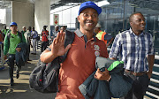 SA Under-20 men's national team head coach Thabo Senong waves goodbye as the Amajita team departed for South Korea at the OR Tambo International Airport on 10 May 2017. SA will take part in the 2017 FIFA U20 World Cup in South Korea.