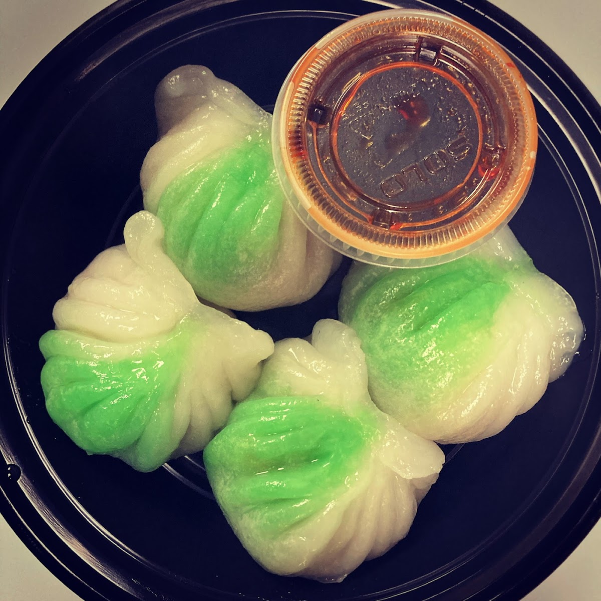 Steamed veggie dumplings. Made with rice flour - gluten free soy sauce available on the side