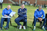 Bidvest Wits head coach Gavin Hunt (C) flanked by his assistants Paul Johnstone and Tyron Damons during the Nedbank Cup last 16 match against Jomo Cosmos at Tsakane Stadium on April 04, 2017 in Johannesburg, South Africa. The match finished 1-1 after extra time with Cosmos winning a penalty shoot-out 5-4 to advance to the quarterfinals.